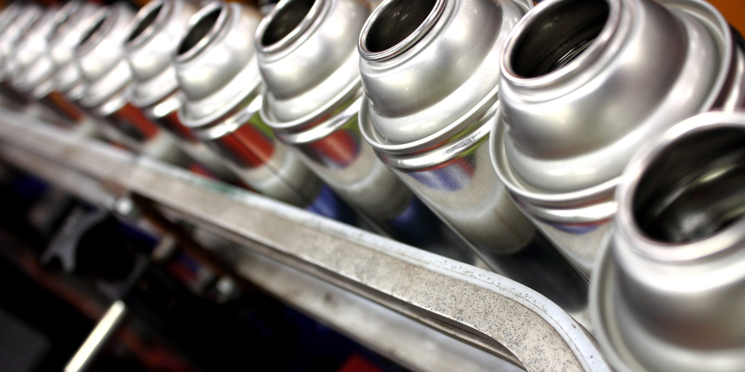 Aerosol can products being made in aerosol filling factory